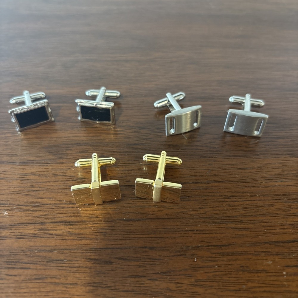 Three Sets Of Cufflinks Cold And Silver Colored